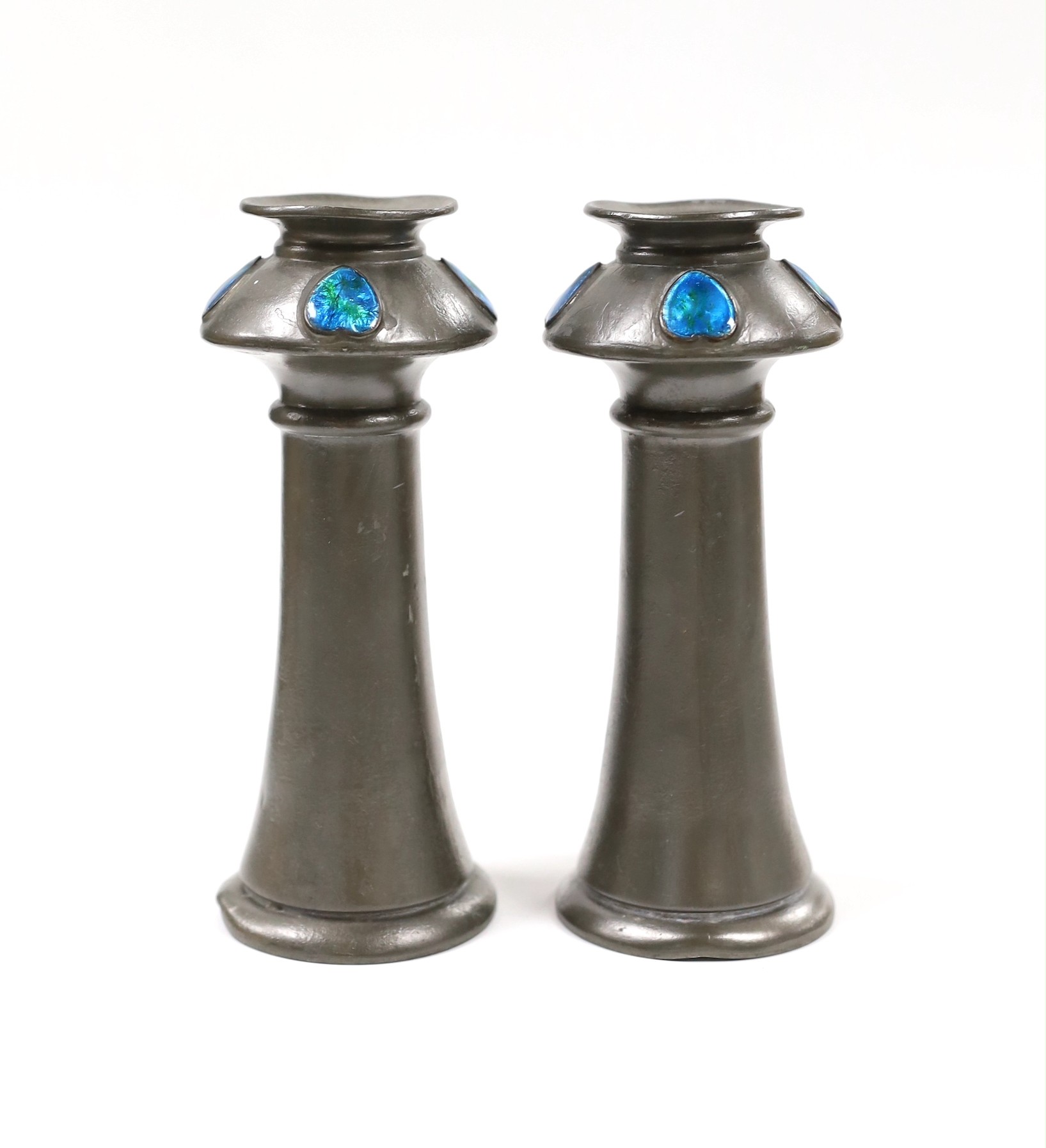 A pair of Liberty's Tudric pewter posy vases, 16cm tall